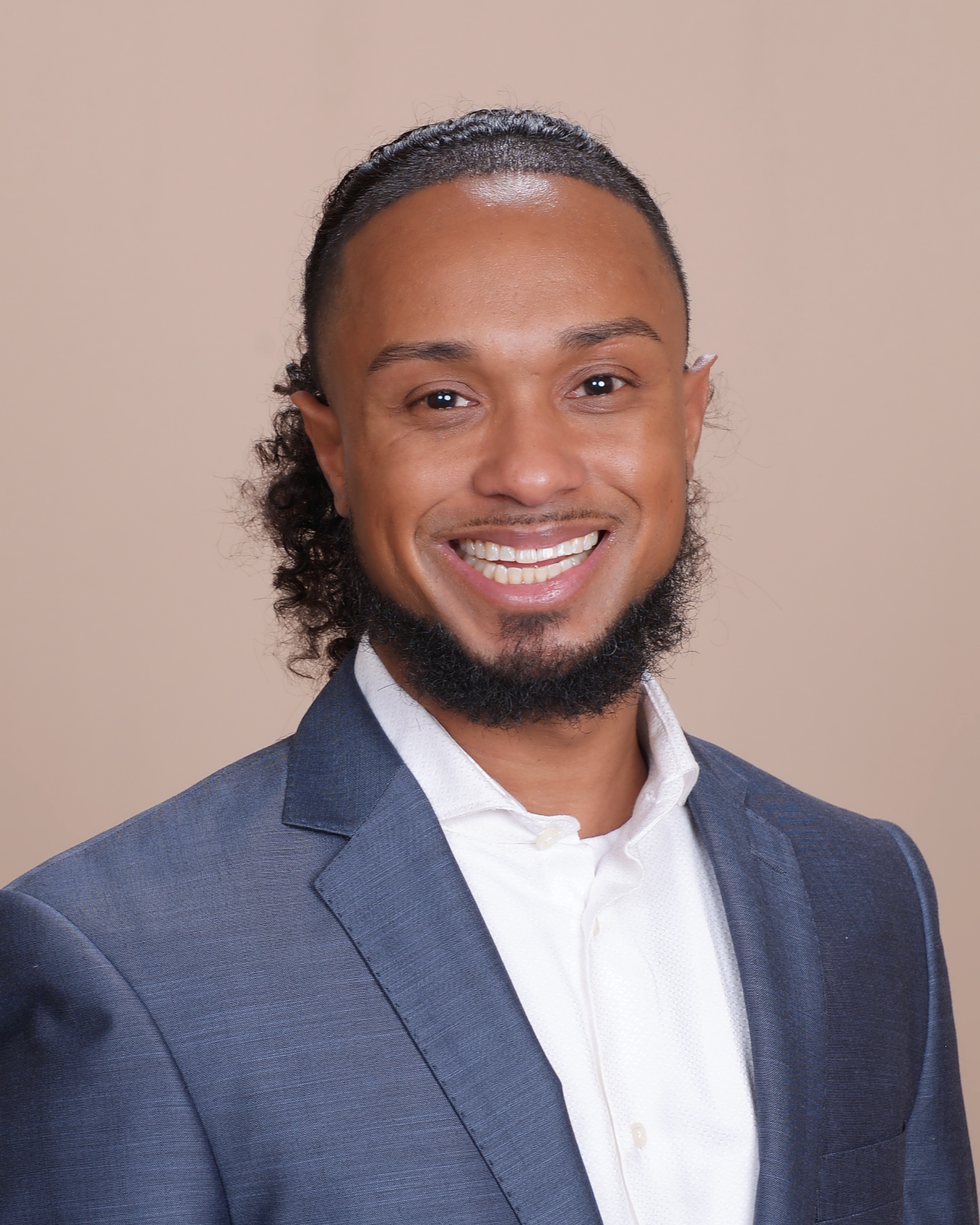 Professional portrait of Orin Greene, AGNP-C, PMHNP-BC